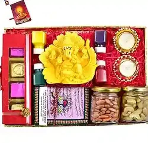 Diwali dry fruits gift box/Diwali Gift hamper/Dry Fruits Diwali gift pack/Dry fruits-100gms of cashew+100gms of almonds+chocolate box+Showpiece figurine+Handmade diary+Moti candle+Rangoli Colours+Card