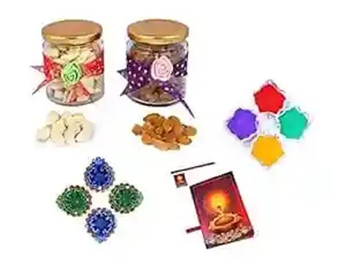 MANTOUSS Diwali Dry Fruit Decorative Glass Jar-Cashew and Raisins(100gms Each),200 GMS + 2 earthern Diya, Diwali Greeting Card and Rangoli Colours