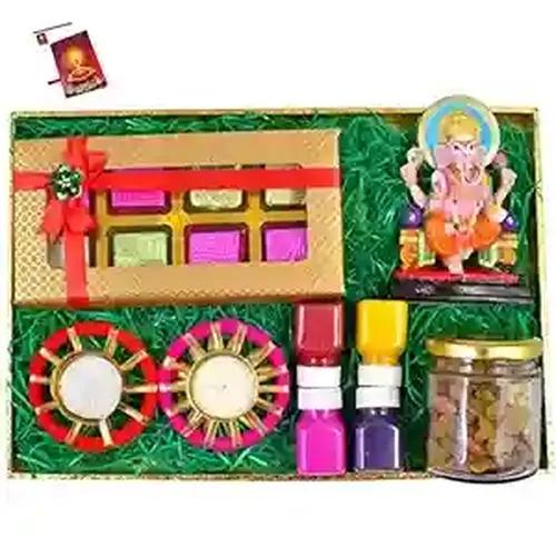 Diwali dry fruits gift box/Diwali dry fruits gift hamper/Diwali dry fruits-Decorated Tray+100 gms of mix dry fruits+Chocolate box+2 designer diya+showpiece figurine+rangoli colours+Diwali Card