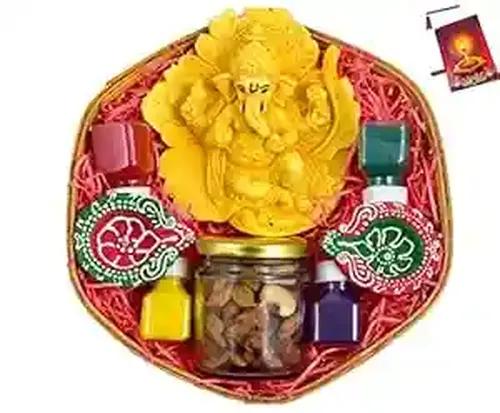 Diwali dry fruits/Diwali dry bruits gift box/Diwali dry fruits-Decorated basket+2 jars(60 gms of almonds and cashew each)+2 elephant candle stand with candles+showpiece figurine+4 rangoli colours+Card