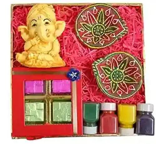 MANTOUSS Diwali gift items/diwali gifts for family and friends/diwali gift box-decorated tray+chocolate box+2 earthen diya+Kundan laxmi paduka+4 rangoli colours+1 designer candle+Greeting Card