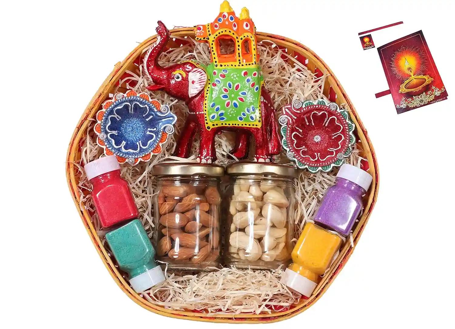 Diwali dry fruits gift box/diwali gift hampers/Dry fruits gift pack-Decorated Basket+2 Jars of Dry Fruits(Almond and Cashew)+handmade diary+Ambawadi elephant+4 Rangoli Colours+Diwali Card